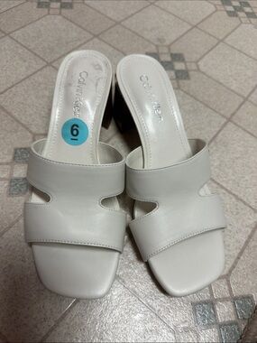 Calvin Klein Women’s Cream Slip-On Block Heel Mules